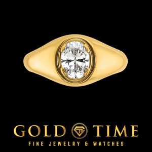 Top view of the oval lab diamond in a polished yellow gold bezel setting