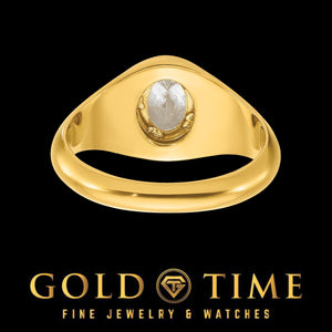 Yellow gold men's solitaire ring viewed from above at an angle, oval stone in bezel