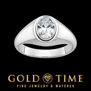 Men's white gold statement ring with a bezel set 1 carat oval lab diamond and wide polished shoulders