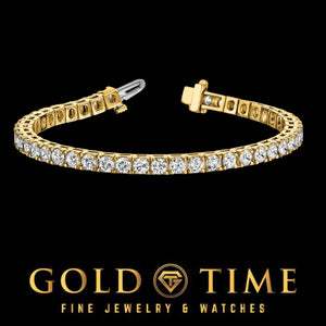Yellow gold diamond tennis bracelet curved to show the box clasp