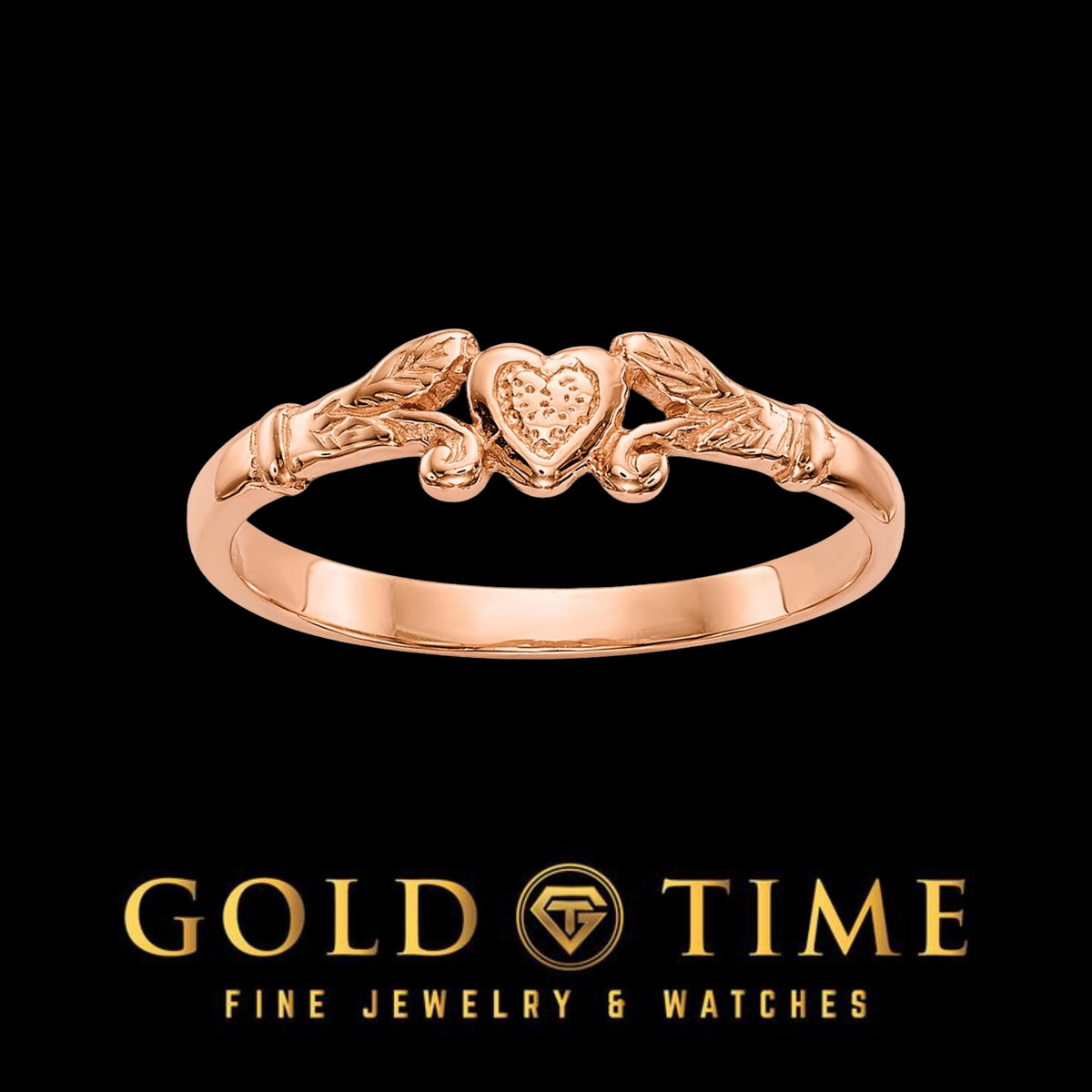 Rose gold heart and leaf ring with a textured heart between sculpted leaves