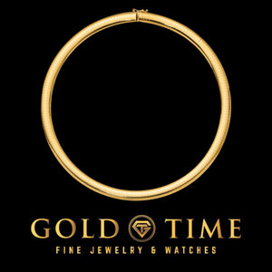 Wide yellow gold domed omega necklace laid in a circle