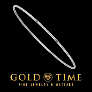 White gold diamond-cut slip on bangle on black