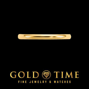 Side view of the slim yellow gold baby band