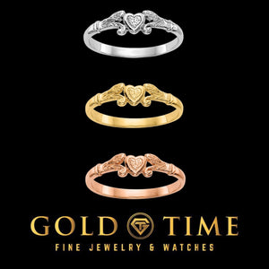 Three heart and leaf rings in white, yellow, and rose gold stacked above the Gold Time logo