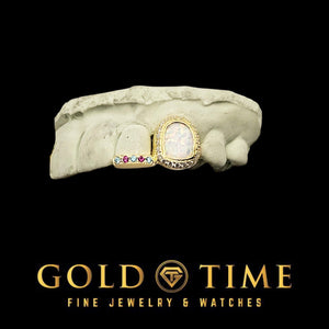 Yellow gold double cap grill with an opal center in a moissanite border and a pink and blue stone tip on a mold