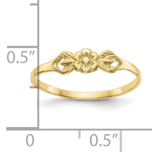 Yellow gold flower ring beside a ruler showing the top is about half an inch wide