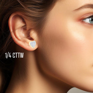 Pave diamond heart stud earring worn on the ear, labeled 1/4 cttw