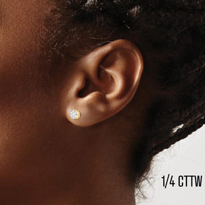 Ear wearing a 1/4 cttw diamond flower cluster stud earring