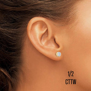 Ear wearing a 1/2 cttw diamond flower cluster stud earring