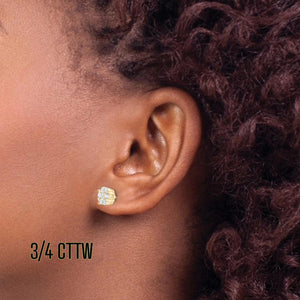 Ear wearing a 3/4 cttw diamond flower cluster stud earring