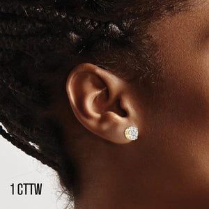 Ear wearing a 1 cttw diamond flower cluster stud earring