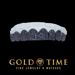 Fully iced 10 piece grillz with black moissanite set in a honeycomb pattern and white metal perm cut edges, on a dental mold