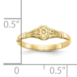 Hibiscus flower ring next to a ruler for size