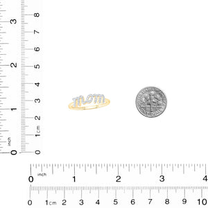 Diamond Mom ring beside a coin and ruler for size