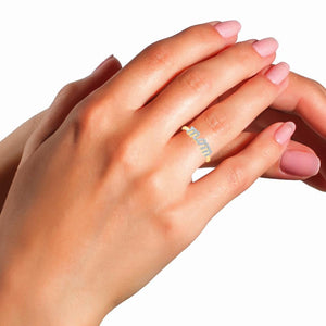 Hand wearing the 10K gold diamond Mom ring