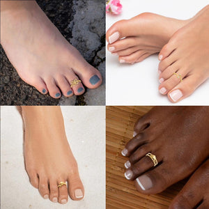 Four feet wearing gold toe rings in different designs