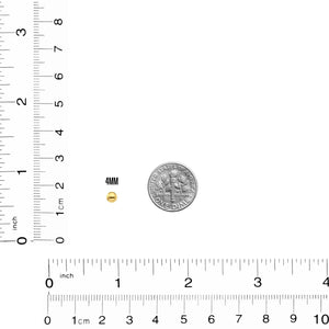 4mm gold spacer bead next to a ruler and a dime for size