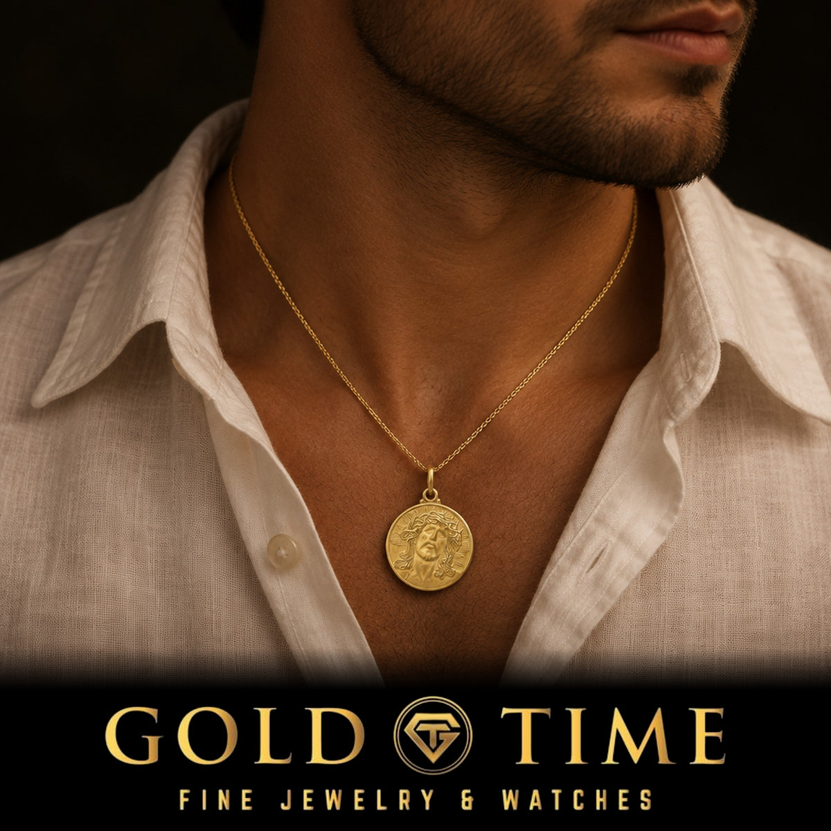 Man in a white linen shirt wearing the 14k yellow gold Jesus medallion with crown of thorns on a fine gold chain, Gold Time