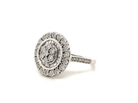 Video of the 10K white gold round and baguette diamond cluster ring