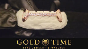 Video of the 6 piece heart cut canine grillz with moissanite centers turning in the light