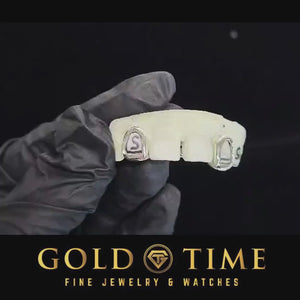 Product video of the open face incisor grillz with bar behind the front teeth
