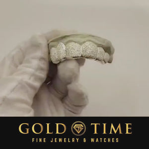Video of a 6 piece diamond dust grillz set turning to show the hand cut frosted texture