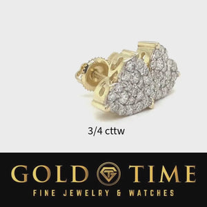 Video of the 3/4 carat total weight diamond heart stud earrings turning against a pale gray background