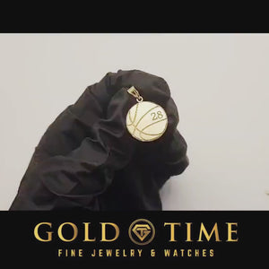 Video showing a yellow gold basketball number pendant held in a gloved hand