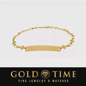 Video of a gold cross link ID bracelet turning to show the cross links and engravable plate
