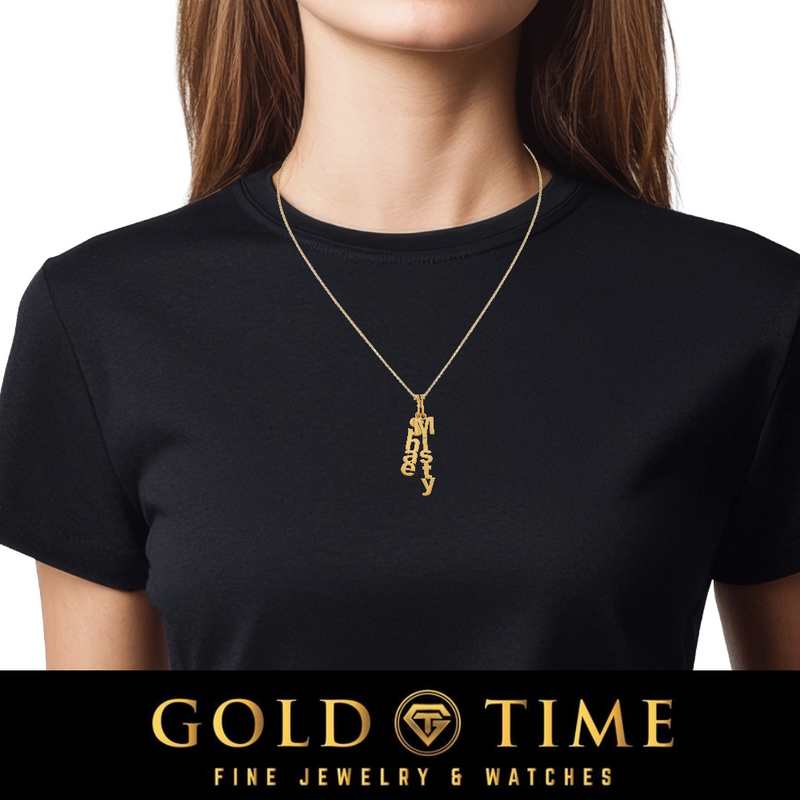 Woman in a black tee wearing a yellow gold necklace with several vertical brushed name charms